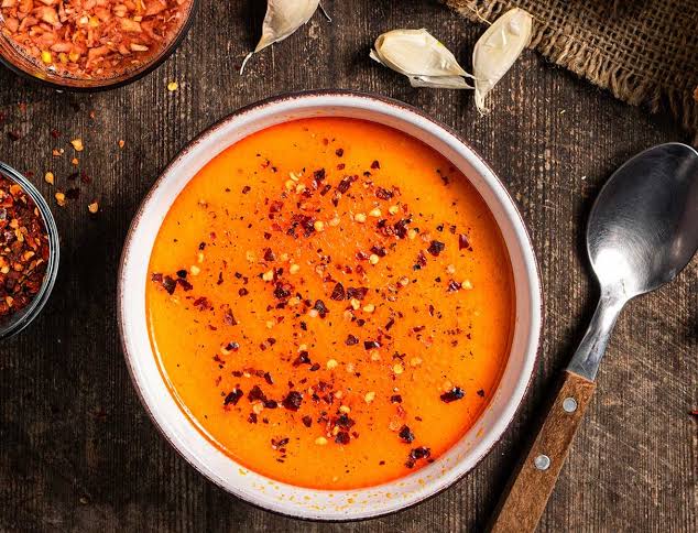 A bowl of Bulgarian tripe soup with garlic and vinegar